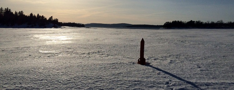 Spar Navigation Buoy in River Ice